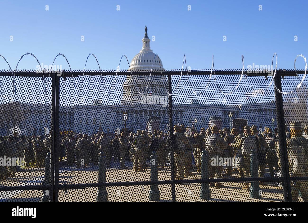 Washington, United States. 19th Jan, 2021. Members of the United States National Guard patrol the U.S. Capitol on Tuesday, January 19, 2021 in Washington, DC As preparations for President-Elect Joe Biden's inauguration is underway, approximately 25,000 troops guard the area after far-right rioters breached the U.S. Capitol on January 6. Photo by Leigh Vogel/UPI Credit: UPI/Alamy Live News Stock Photo