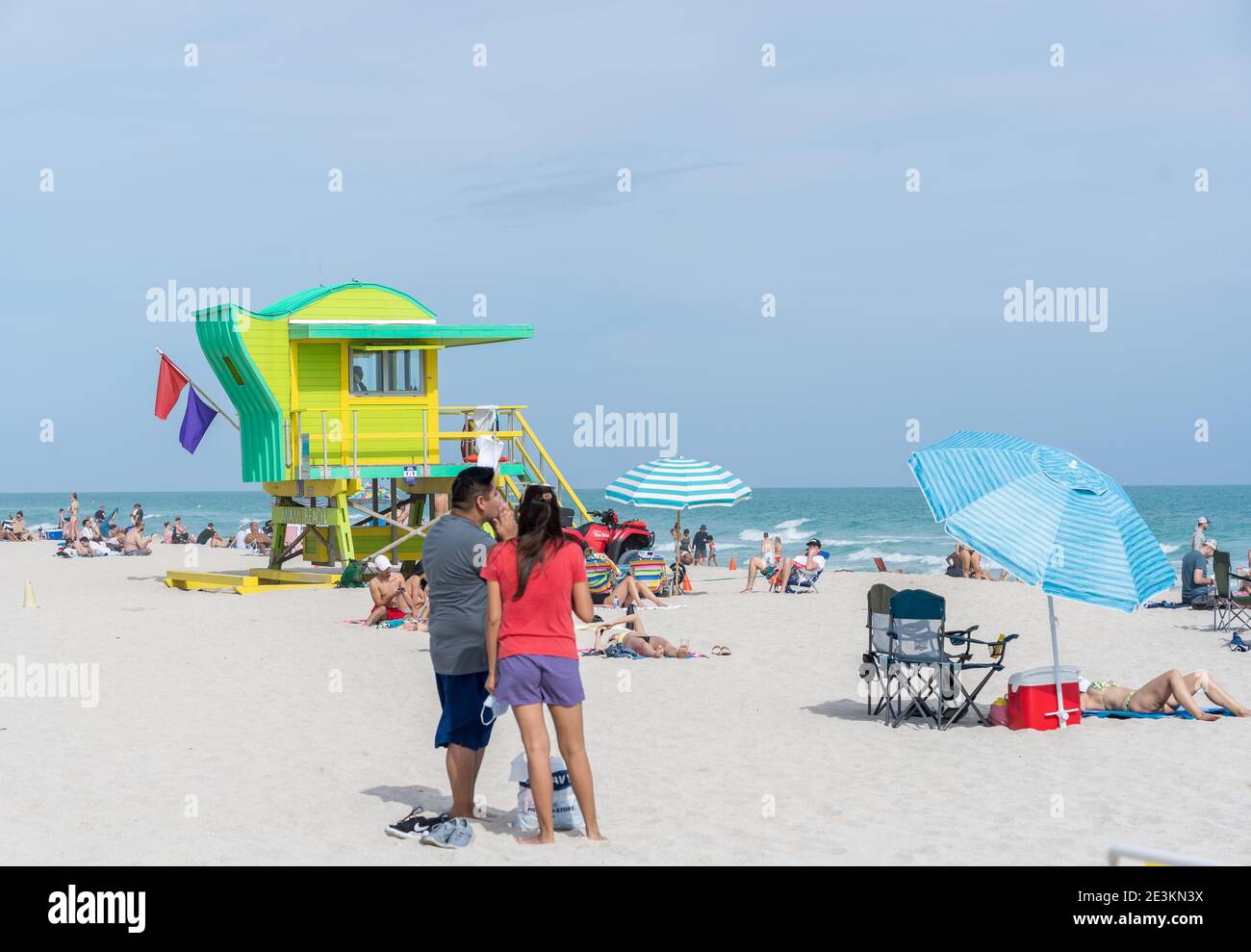 Miami, Florida - January 2, 2021: People Sunbathing in Miami Beach. Stock Photo
