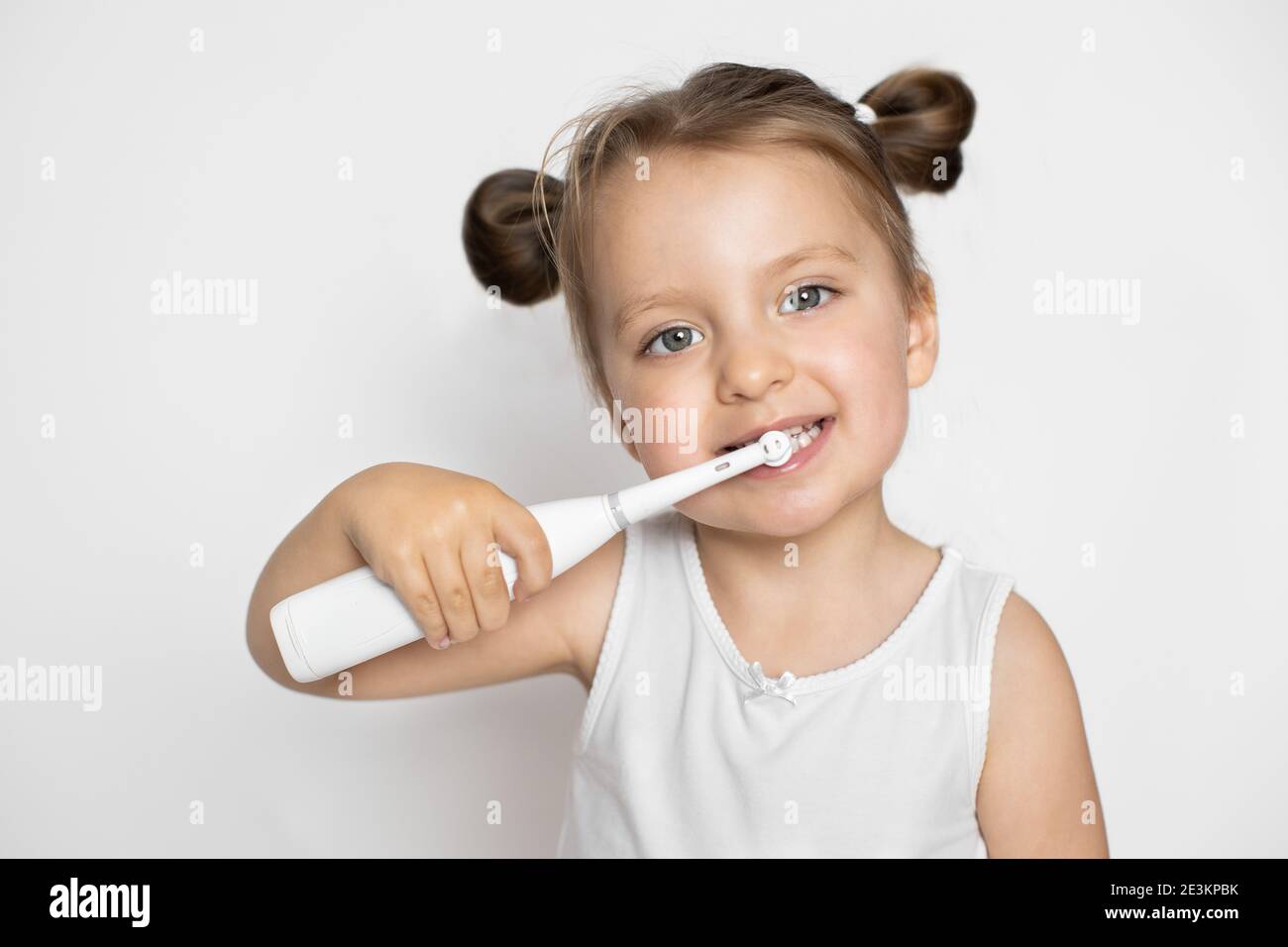 Perfect removing of the plaque with a modern toothbrushPretty little
