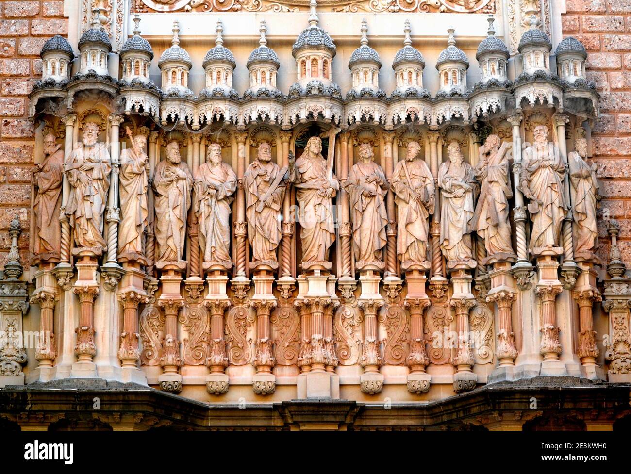 Sculptures of Jesus and Apostles above the Entrance to the Basilica of the Montserrat Monastery Stock Photo