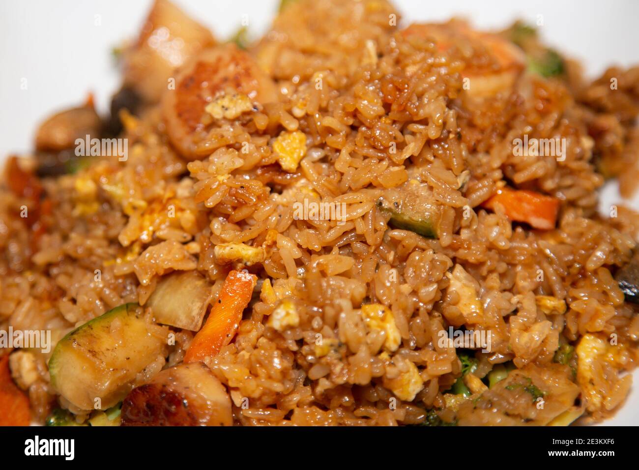 Shrimp and scallops in fried rice and vegetables Stock Photo Alamy