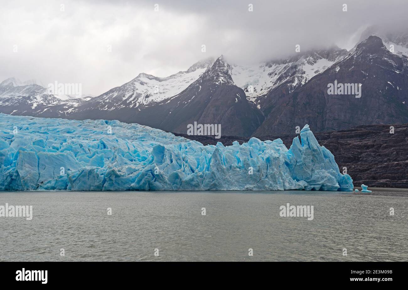 Grey Glacier by Grey Lake with the Andes mountain in the fog, Torres del Paine national park, Patagonia, Chile. Stock Photo
