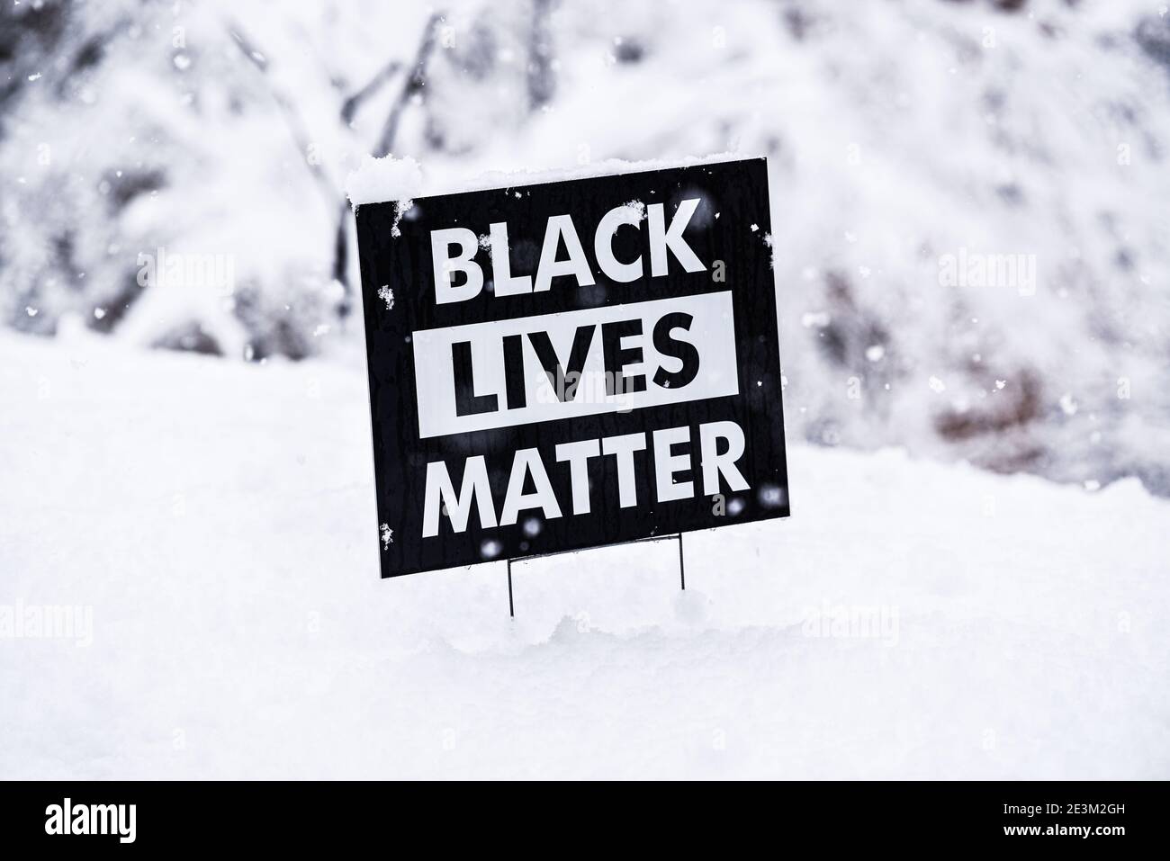 Dramatic image of Black Lives Matter sign in the snow. Stock Photo