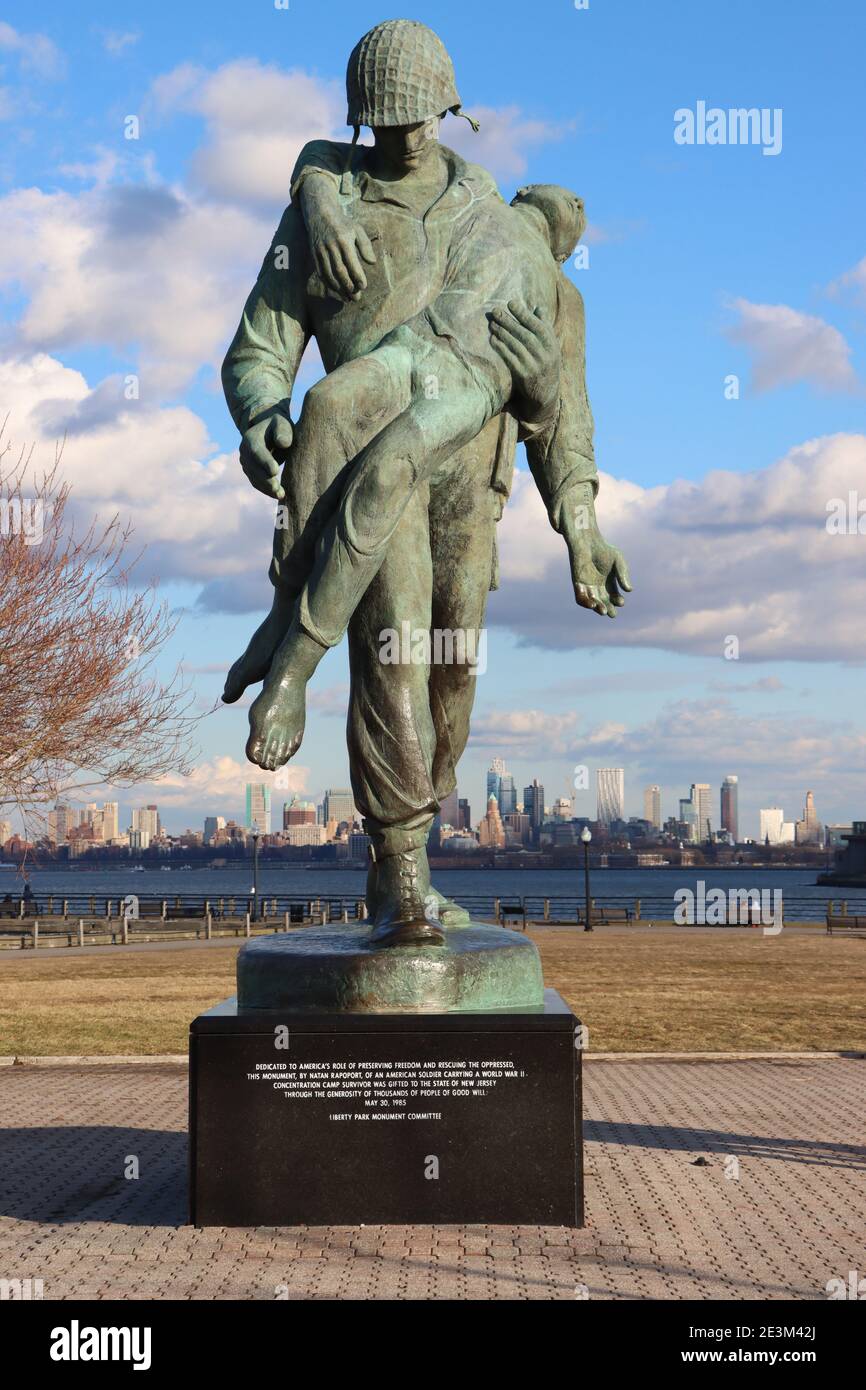 Liberation Monument - Liberty State park WW2 memorial - shows a US soldier carrying a concentration camp survivor, Sculptor - Natan Yaakov Rapoport Stock Photo