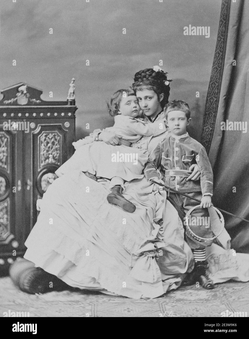 Maria Teresa of Portugal with her two stepchildren Ferdinand Karl and Margareta Sophie. Stock Photo
