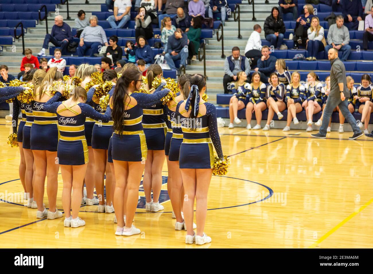 The Bishop Dwenger High School Dance Team, the Tuffettes, performs at center court in their gymnasium in Fort Wayne, Indiana, USA. Stock Photo