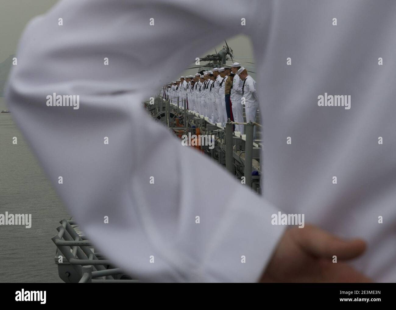 Mannig The Rails Manning the rails as USS America departs Rio De Janeiro 140809 Stock ...