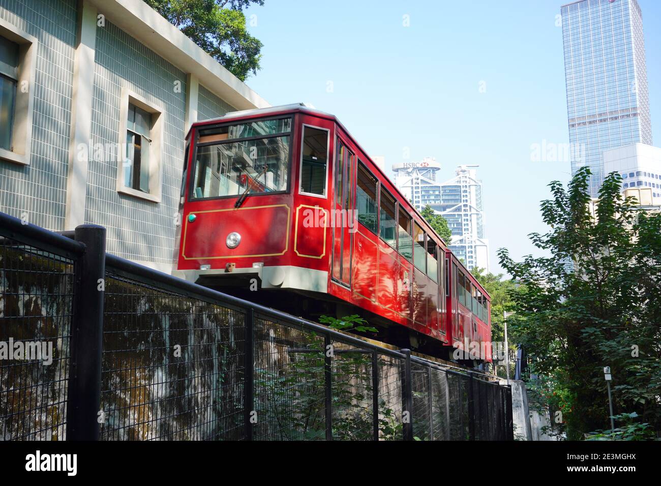 The Peak Tram, a Funicular Railway and Landmark of Hong Kong. Medium Shot, Low Angle View Stock Photo