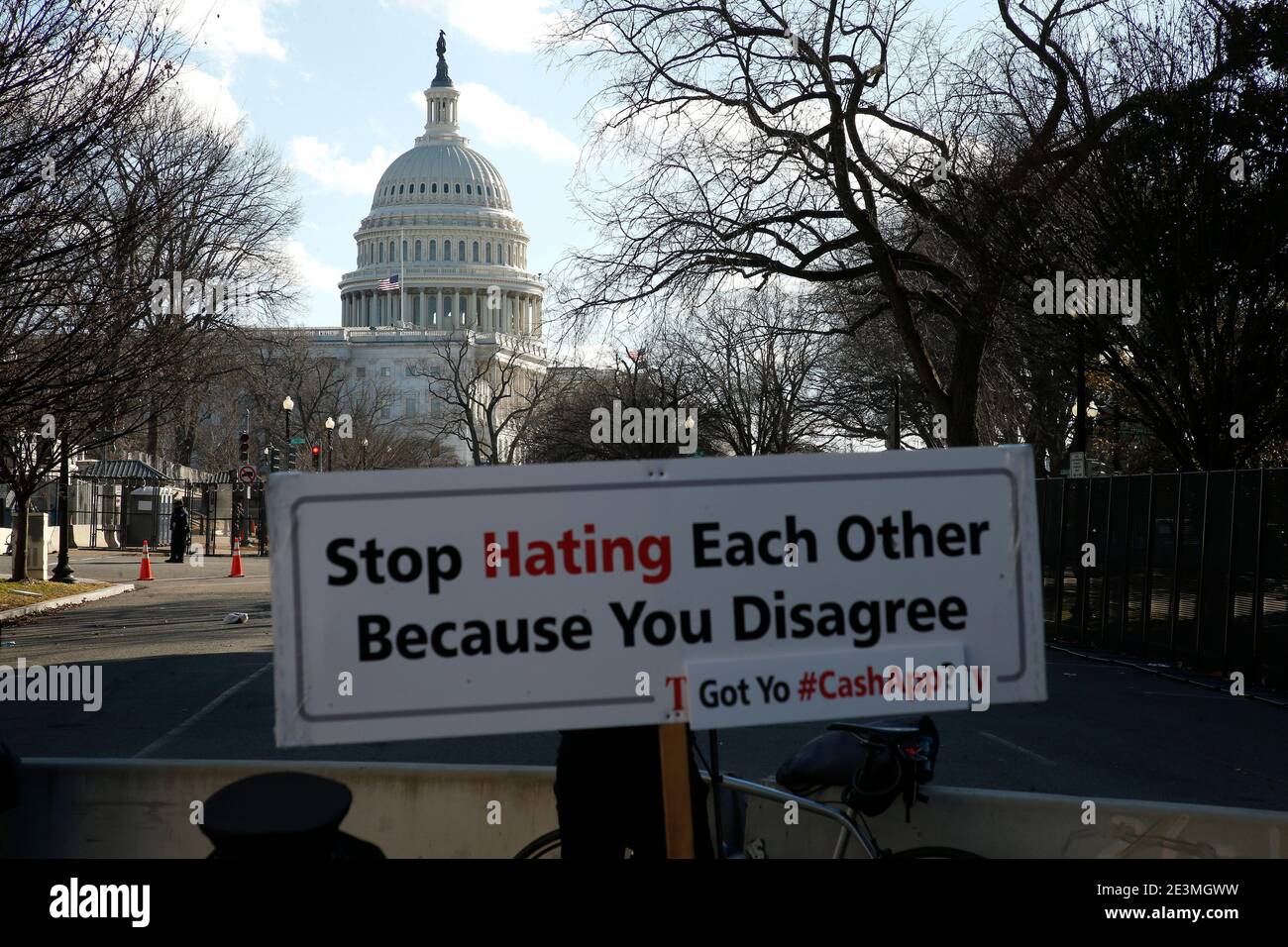 Washington, United States. 19th Jan, 2021. A sign displaying an anti-hate message is seen near the Capitol Hill.After the January 6th riots at the US Capitol, the FBI has issued a statement warning of further threats to the nation's capital as well as in all fifty states. In the waning hours of the current administration some 25,000 National Guardsmen have been deployed to the city to stand guard in preparation for Joe Biden's inauguration as the 46th U.S. President. Credit: SOPA Images Limited/Alamy Live News Stock Photo