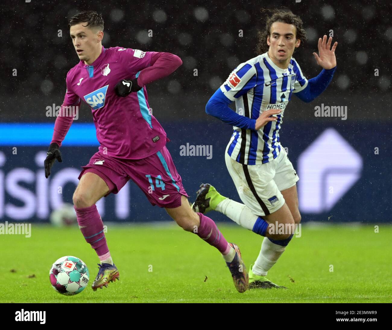 Berlin, Germany. 19th Jan, 2021. Football: Bundesliga, Hertha BSC - TSG 1899 Hoffenheim, Matchday 17 at Olympiastadion. Matteo Guendouzi (r) of Hertha against Christoph Baumgartner (l) of Hoffenheim. Credit: Soeren Stache/dpa-Zentralbild/ZB - IMPORTANT NOTE: In accordance with the regulations of the DFL Deutsche Fußball Liga and/or the DFB Deutscher Fußball-Bund, it is prohibited to use or have used photographs taken in the stadium and/or of the match in the form of sequence pictures and/or video-like photo series./dpa/Alamy Live News Stock Photo