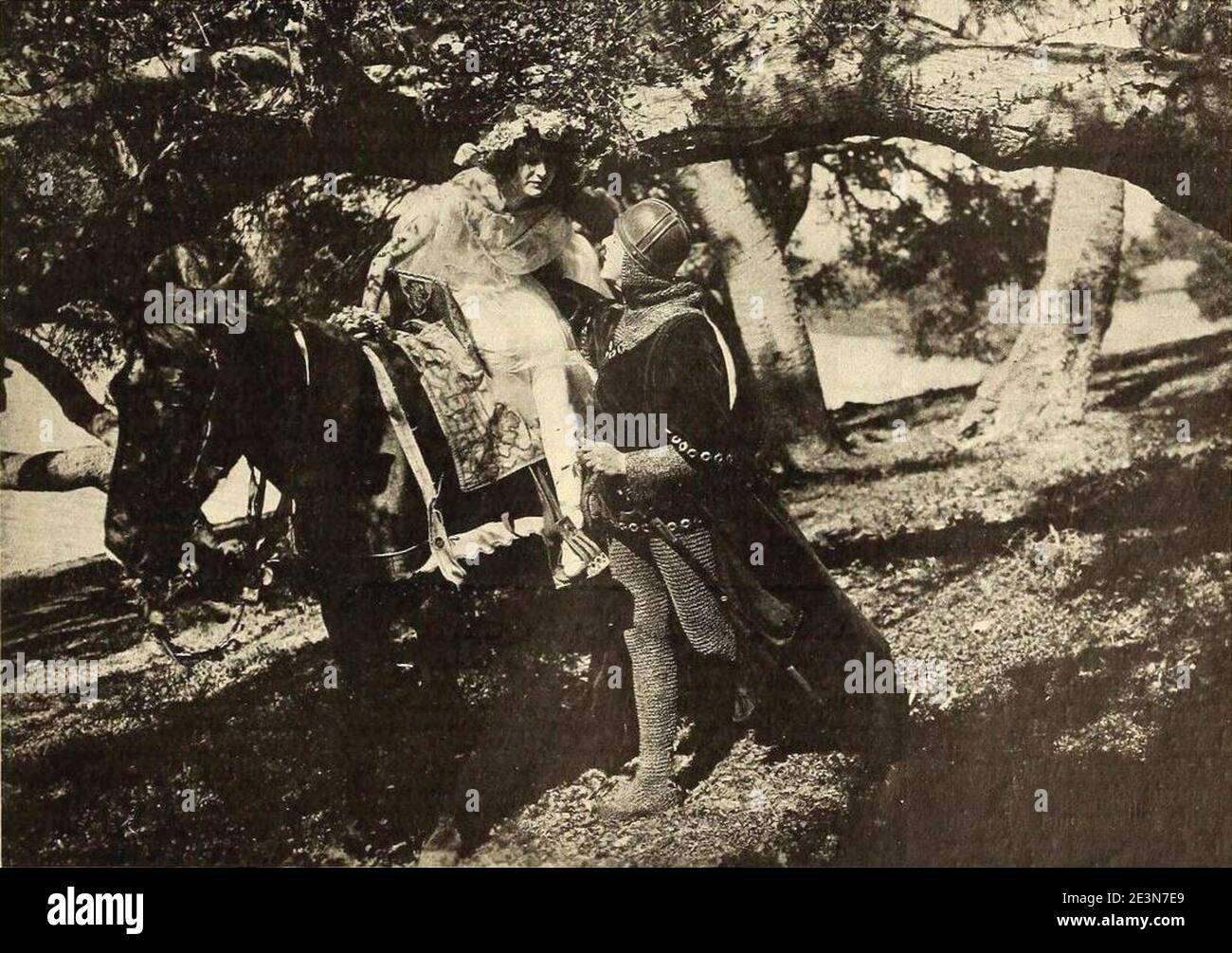 Still from the American film The Poet of the Peaks (1915) with Vivian Rich and David Lythgoe. The caption notes that the film is based upon John Keat's poem 'La Belle Dame sans Merci.' On page 5 of the April 3, 1915 Reel Life. Stock Photo