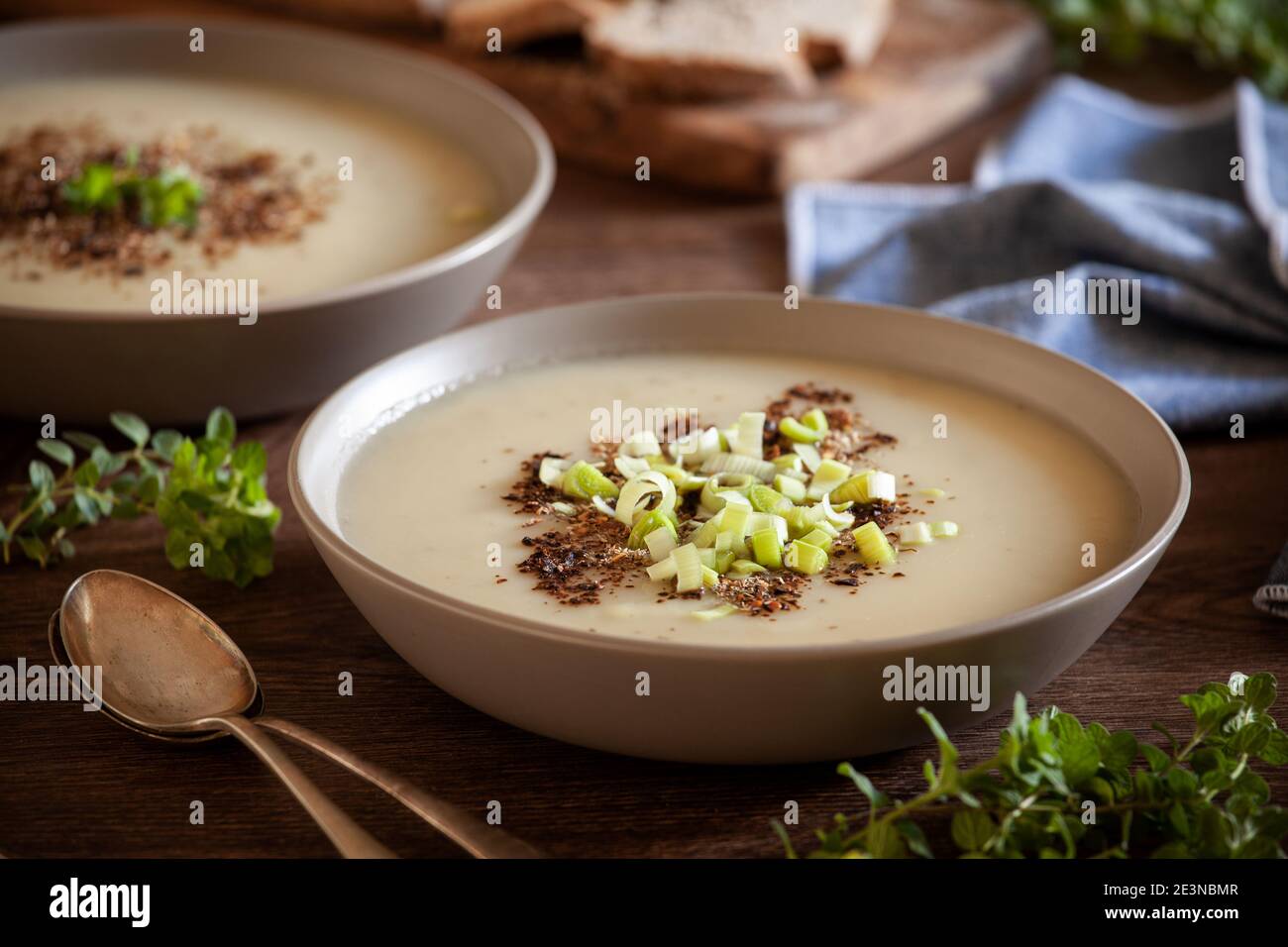 Bowls of homemade leek and potato soup Stock Photo