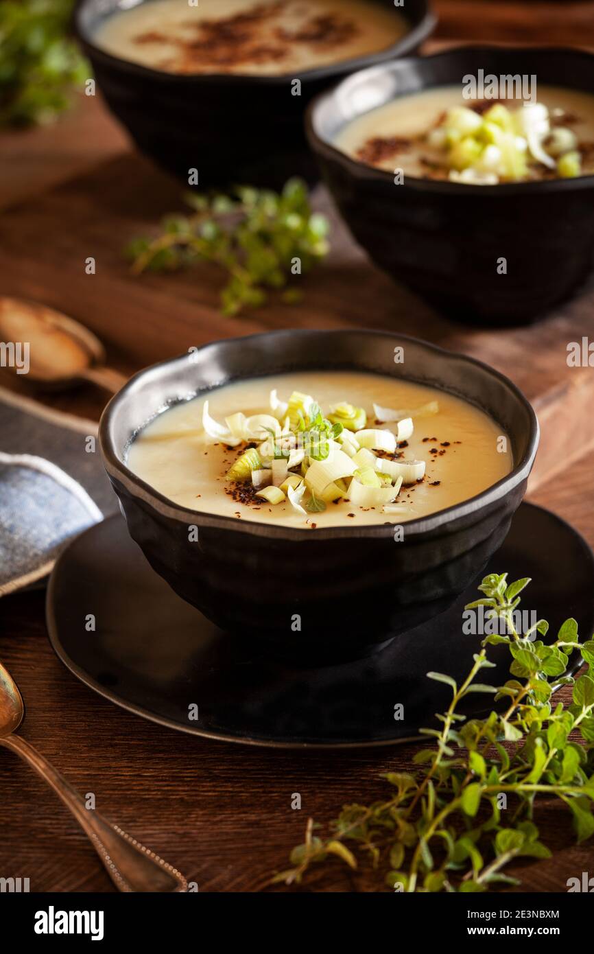 Bowls of homemade leek and potato soup Stock Photo
