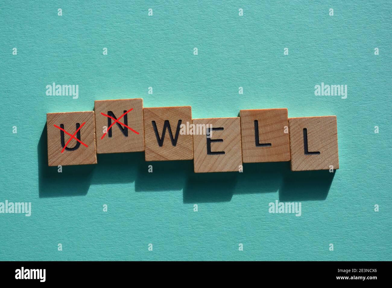 Unwell, word with prefix Un crossed out leaving the positive word, Well Stock Photo