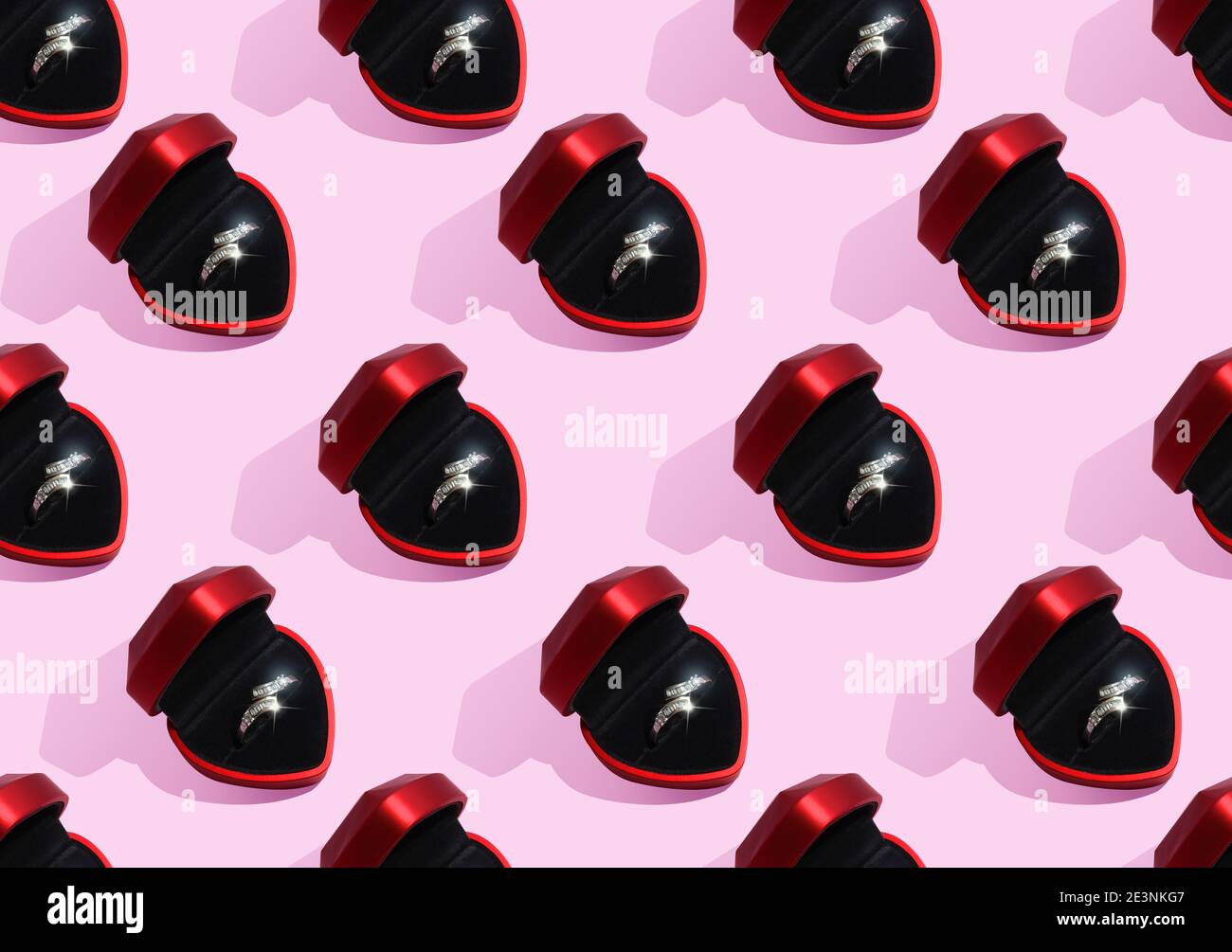 Seamless pattern with red ring box on pink Stock Photo