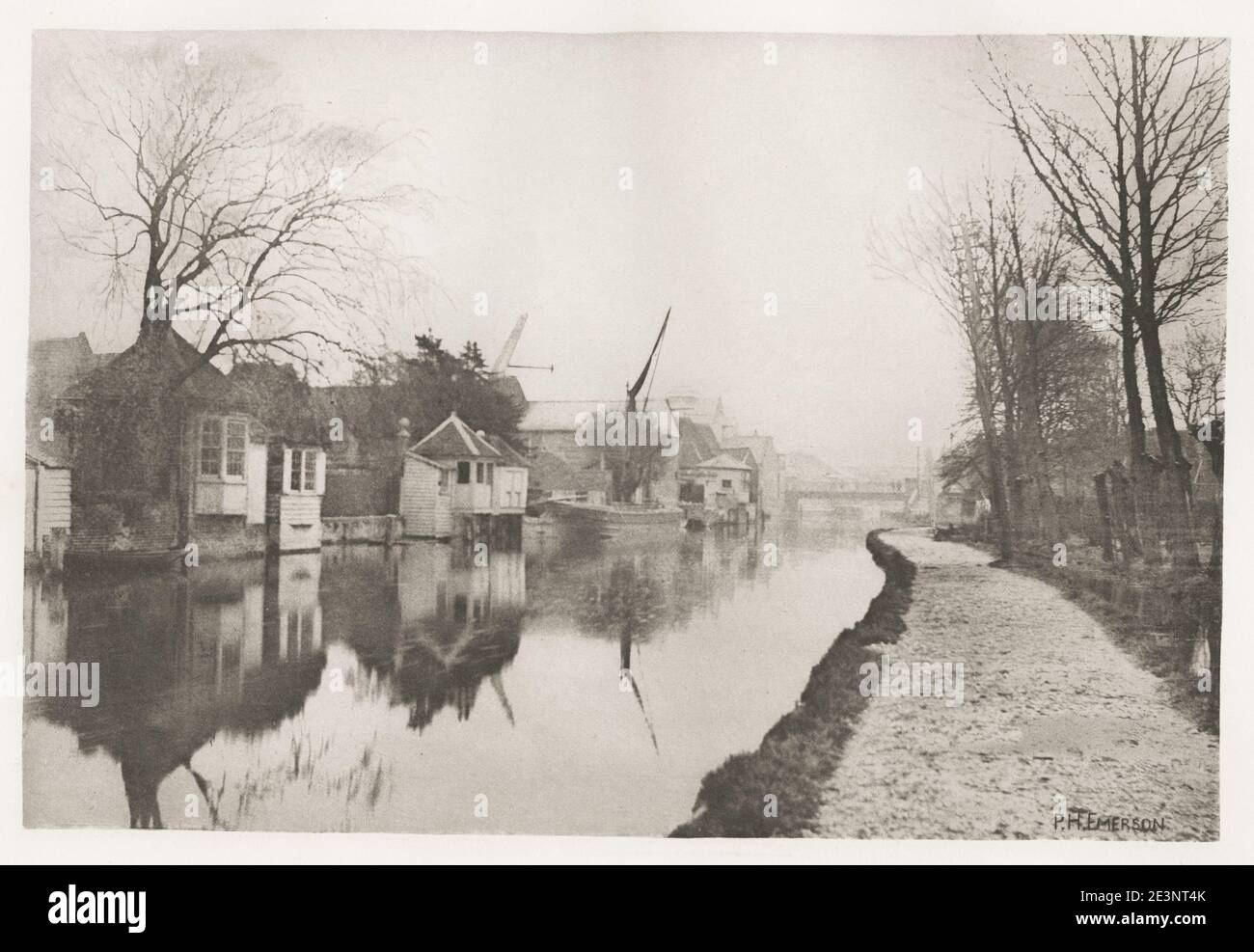 Vintage 19th century/1900's photograph by Peter Henry Emerson. Emerson was a British writer and photographer. His photographs are early examples of promoting straight photography as an art form. He is known for taking photographs that displayed rural settings and for his disputes with the photographic establishment about the purpose and meaning of photography. River bank scene, Norfolk? Stock Photo