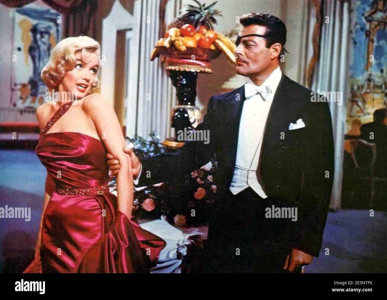 HOEW TO MARRY A MILLIONAIRE 1953 20th Century Fox film with Marilyn Monroe and phony tycoon Alexander D'Arcy Stock Photo