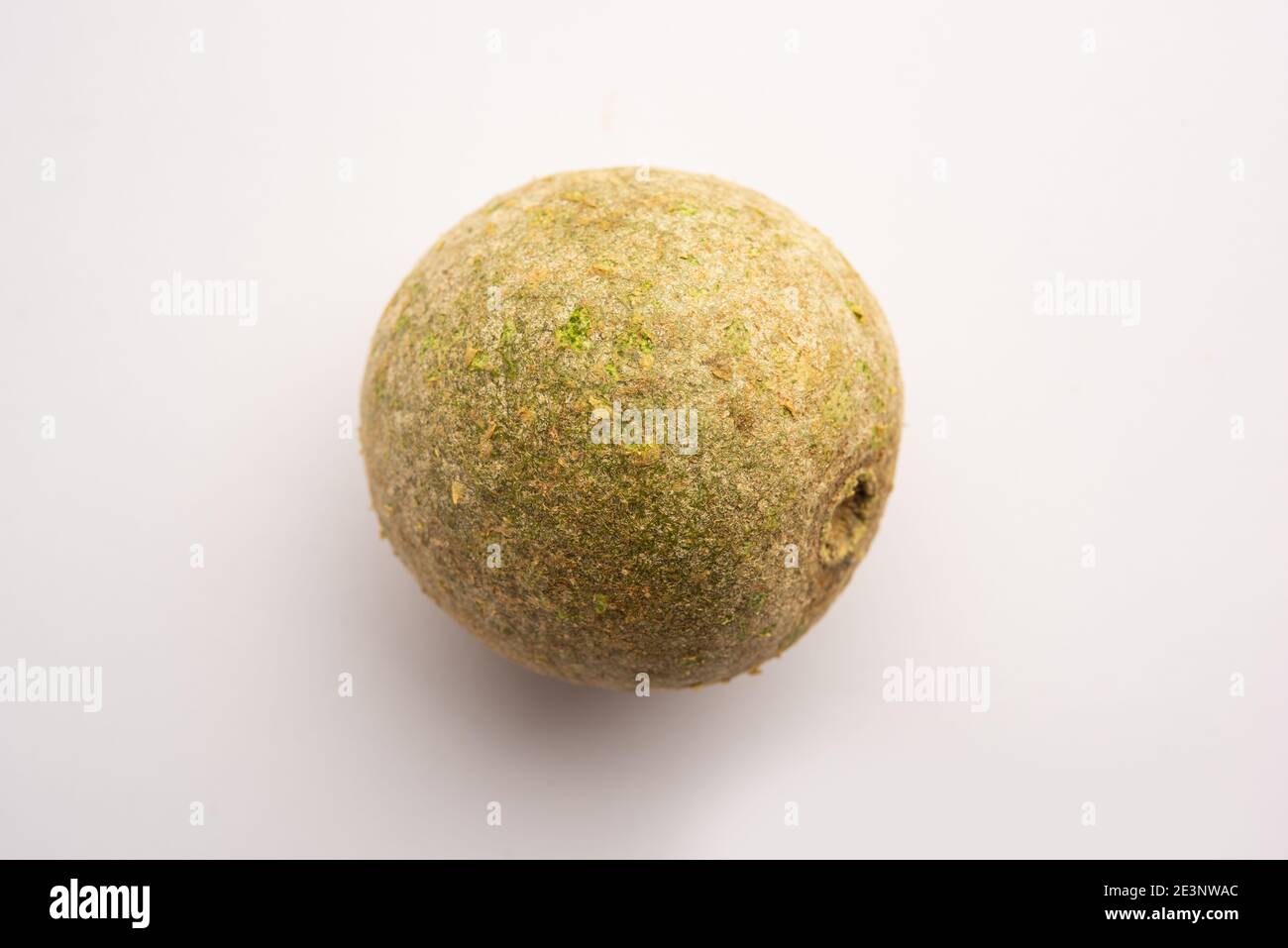Wood apple or Kavath fruit, isolated over white background Stock Photo