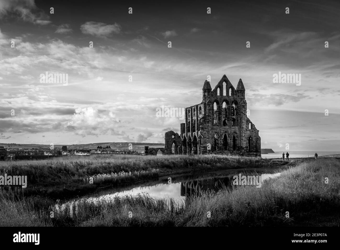 Whitby Abbey was a 7th-century Christian monastery that later became a Benedictine abbey. overlooking the North Sea on the East Cliff above Whitby in Stock Photo