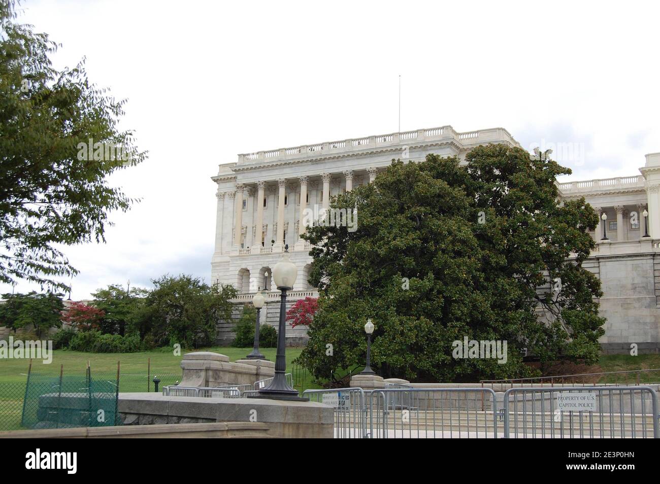 US Capital building and house of representatives Chamber building Washington DC USA congress famous history historic lamp light outside fence Stock Photo