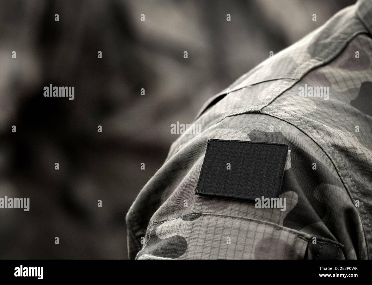 Anarchism flag on military uniform. Black flag is the traditional anarchist symbol. Stock Photo