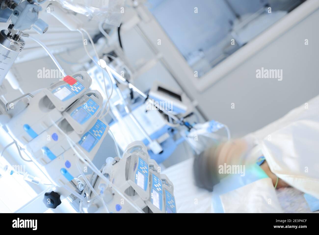 Small child receives treatment in the department of pediatric intensive care. Stock Photo