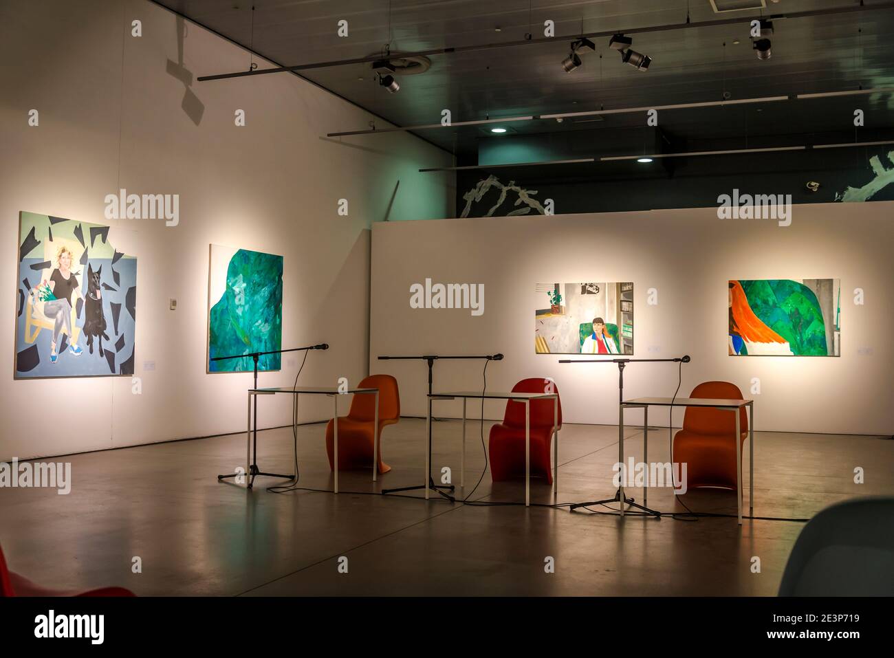 Exhibition and empty chairs ready for artist talk and conference during coronavirus pandemic