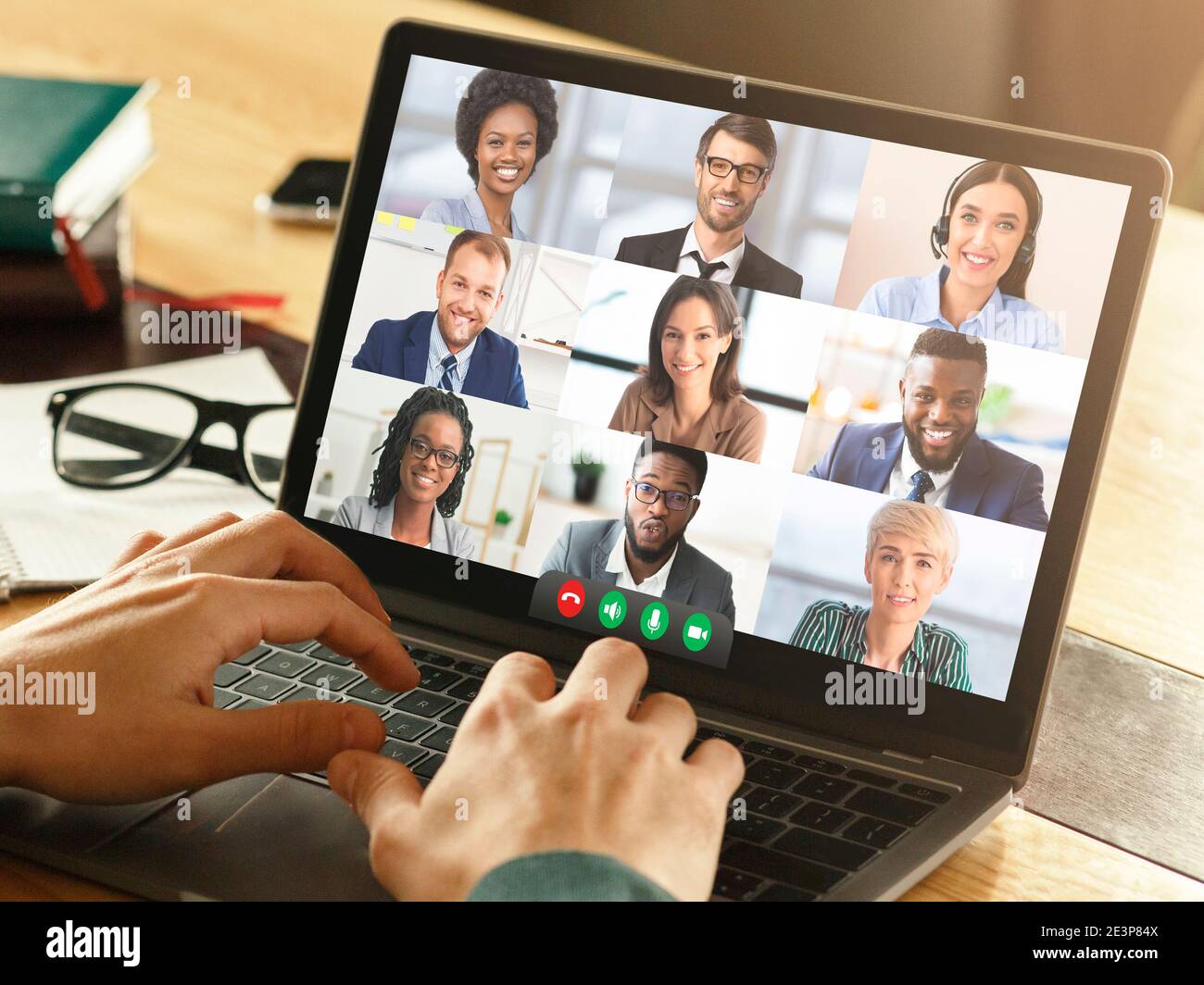 Coworkers Having Online Meeting Making Video Call On Laptop Indoor Stock Photo