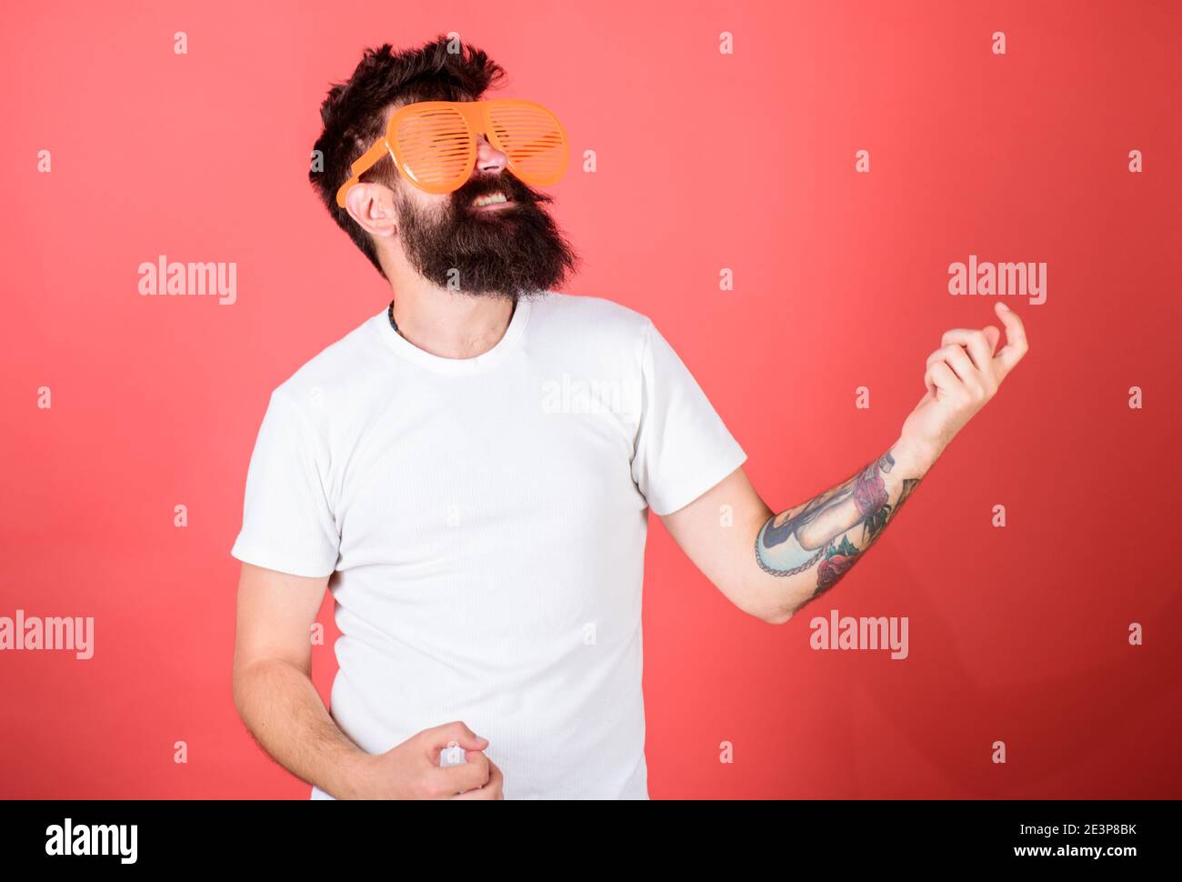 Hipster wear shutter shades extremely big sunglasses. Man bearded