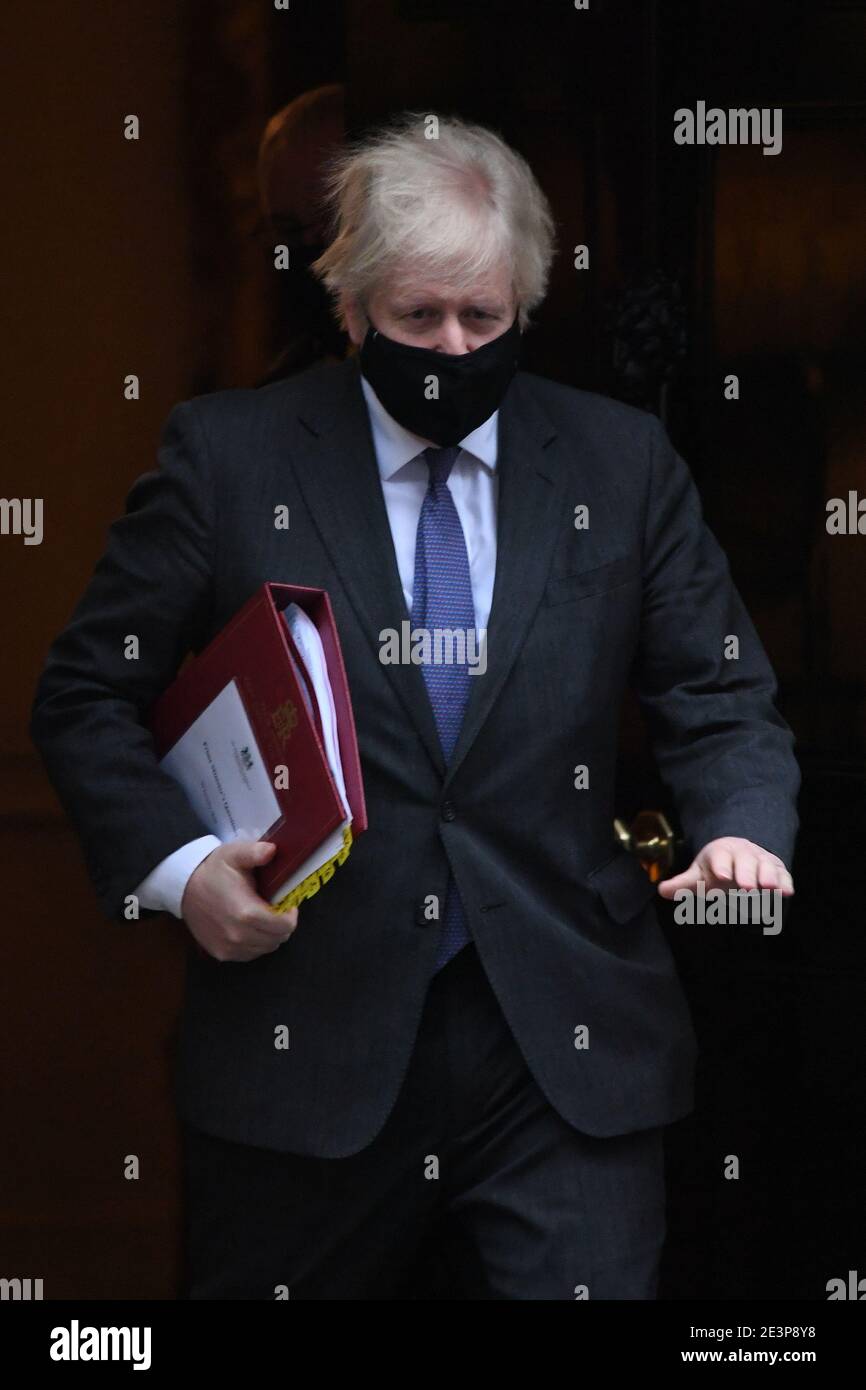 Prime Minister Boris Johnson leaves 10 Downing Street to attend Prime Minister's Questions at the Houses of Parliament, London. Picture date: Wednesday January 20, 2021. Stock Photo