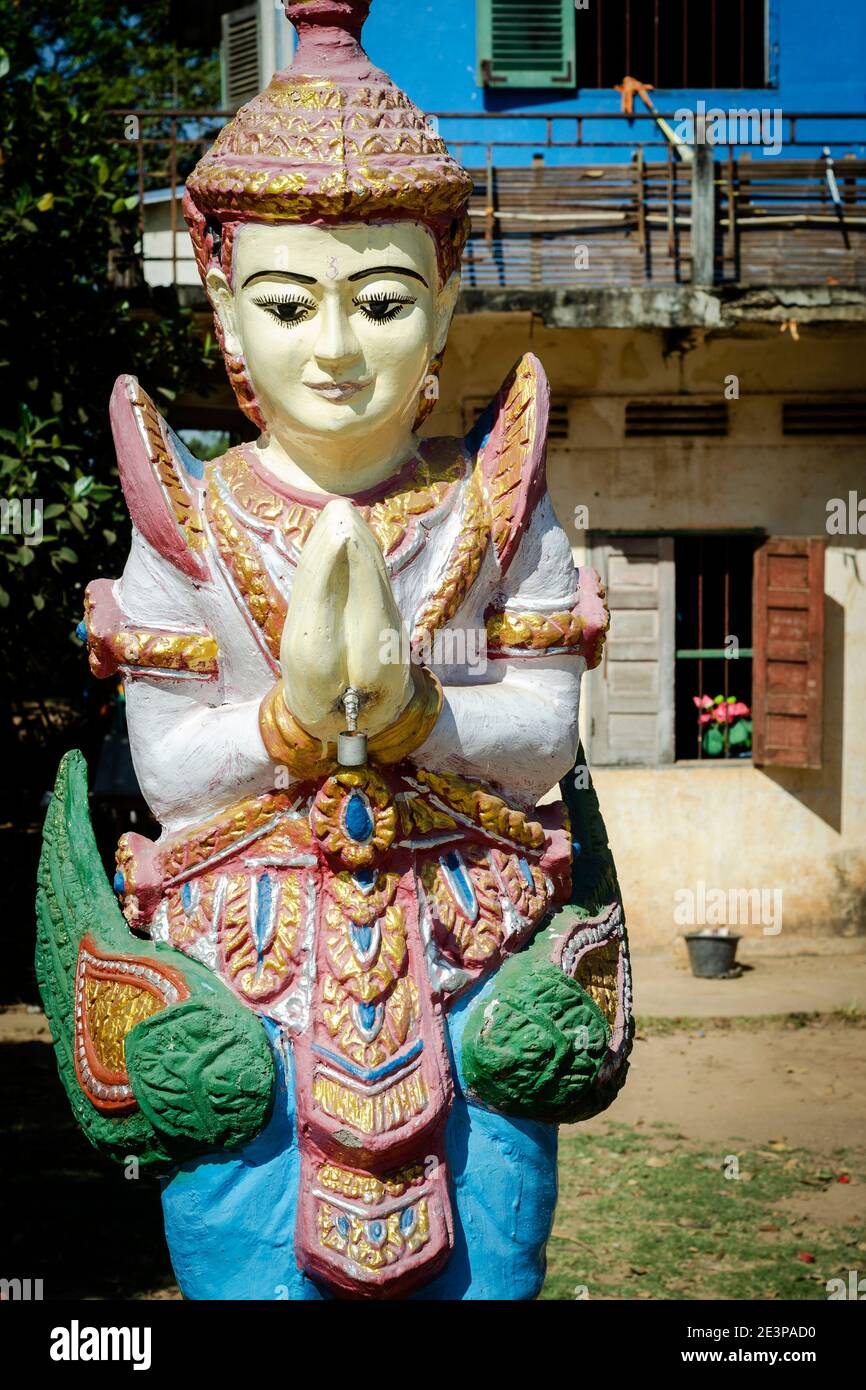 buddhist religious Khmer statue outdoor at Wat Svay Andet UNESCO Lakhon Khol heritage temple in Kandal Province Cambodia Stock Photo