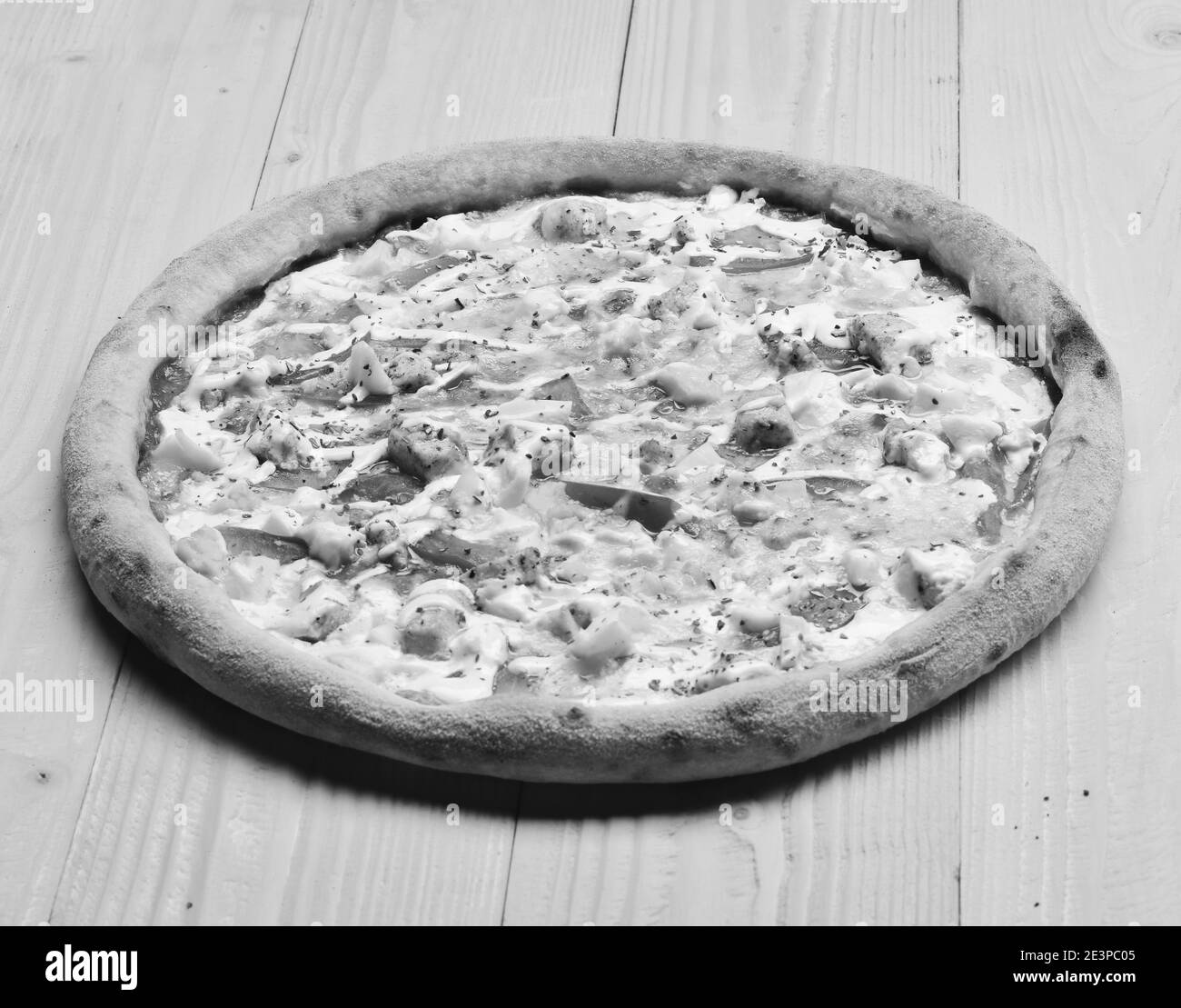 Take away food with crunchy edges. Spicy pizza with sauce and seasoning. Pizza with bacon