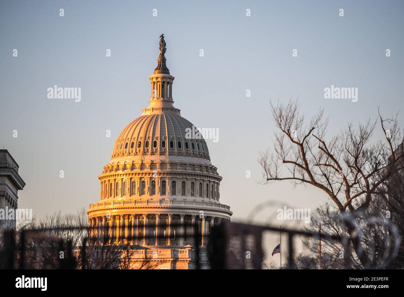 WASHINGTON D.C., JANUARY 19- A general view of the Capitol Building surrounded by fences on the Eve the United States Presidential Inauguration of Joe Biden on January 19, 2021 in Washington, DC Photo: Chris Tuite/ImageSPACE /MediaPunch Stock Photo