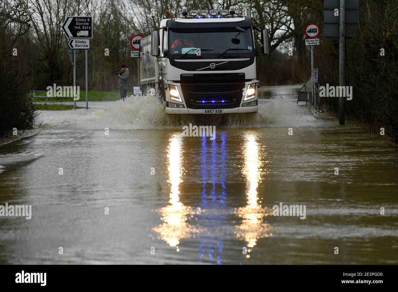 Vehicles navigate the flooded Mountsorrel Lane in Leicestershire, as Storm Christoph is set to bring widespread flooding, gales and snow to parts of the UK. Heavy rain is expected to hit the UK, with the Met Office warning homes and businesses are likely to be flooded, causing damage to some buildings. Picture date: Wednesday January 20, 2021. Stock Photo