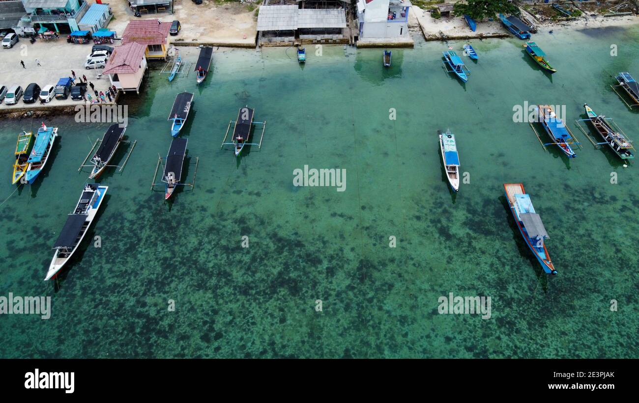 Aerial view of top down picture of colorful wooden boats. Boats at the ...