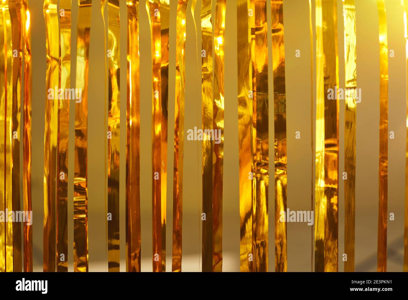 Festive background with closeup of golden foil fringe curtains at a party  photo booth Stock Photo - Alamy