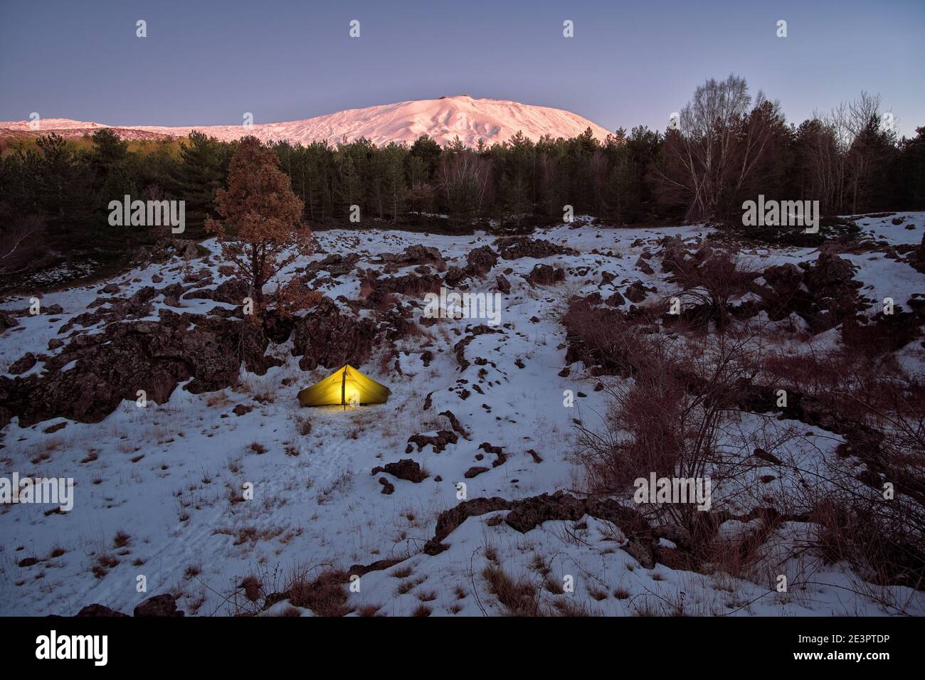 winter view wild camp in tent at twilight in Etna Park a touristic destination of Sicily outdoor tourism and nature Stock Photo