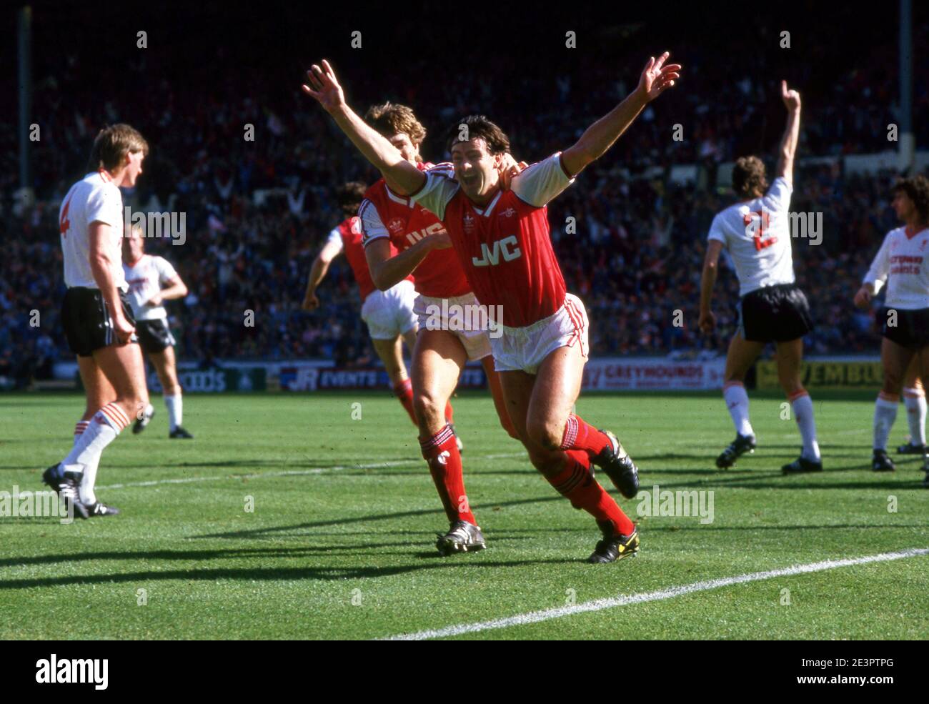 Charlie Nicholas of Arsenal  scores one of his two goals during the 2-1 win over Liverpool in the Littlewoods League Cup Final at Wembley Stadium 5 April 1987  Photograph by Tony Henshaw Stock Photo