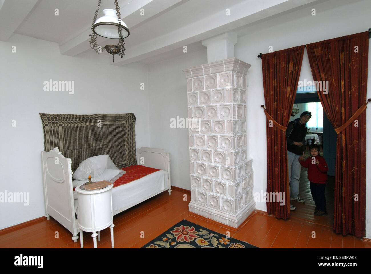 Bedroom in gray house. Lesya Ukrainka residence-museum in Kolodiazhne. Stock Photo