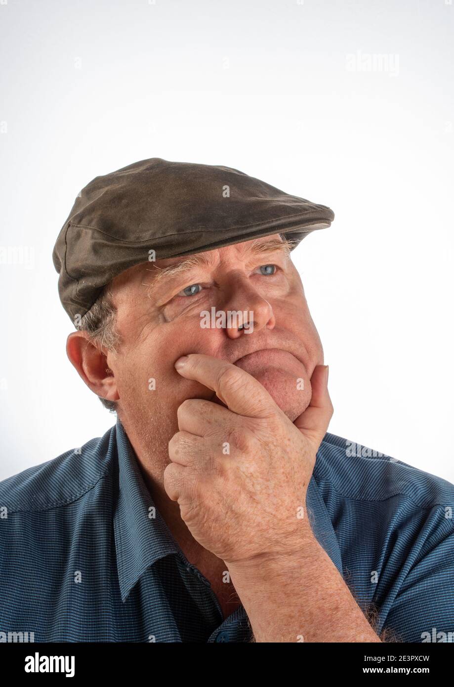 Free Photo  Mature man pretending to show something in shirt