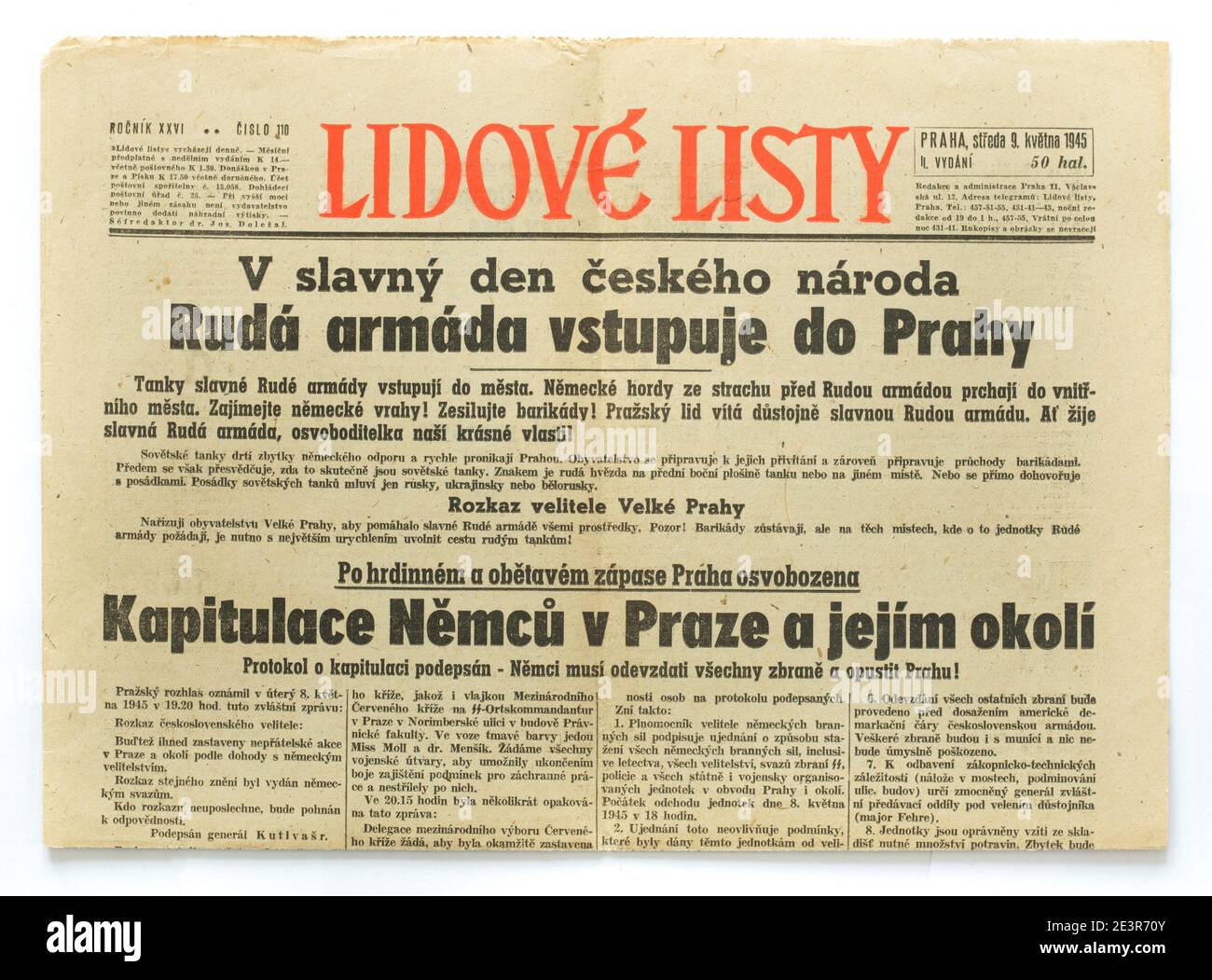 Czechoslovak newspaper 'Lidové listy' ('People Papers') issued on 9th May 1945 with announcements of the surrender of the Nazi German forces in Prague and surroundings and of the entry of the Red Army into Prague. The first line in Czech language means: In the glorious day of the Czech nation, the Red Army is entering in Prague. The second line means: Prague is liberated after the heroic and sacrificial struggle. The surrender of the Germans in Prague and surroundings. The protocol of surrender is signed. The Germans have to lay the weapons down and leave Prague! The full text of the protocol Stock Photo