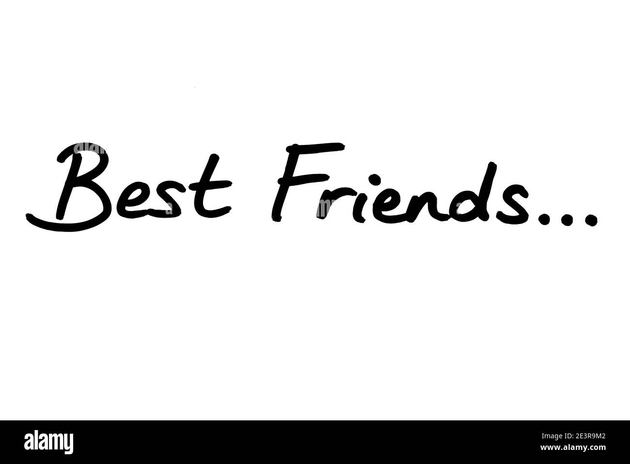 Best Friends… handwritten on a white background. Stock Photo