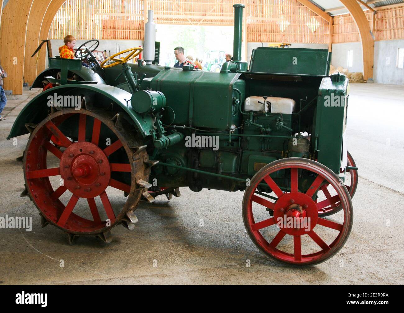 MUNKTELL TRACTOR from 1940s displayed in a farm barn Stock Photo