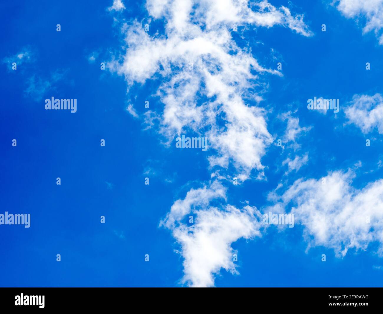 Blue sky with fleecy clouds Stock Photo