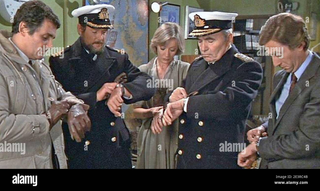 NORTH SEA HIJACK aka Assault Force aka ffolkes 1980 Universal/CIC film with Roger Moore second from left and Faith Brook next to James Mason Stock Photo