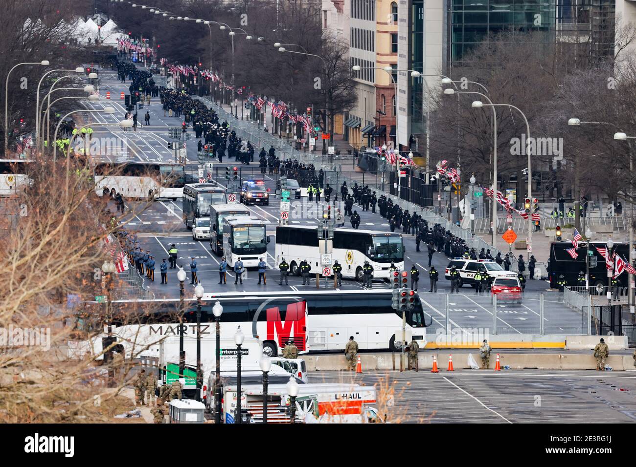 Washington, DC, USA. 20th Jan, 2021. Members of law enforcement line the streets ahead of the inauguration of U.S. President-elect Joe Biden on January 20, 2021 in Washington, DC. During today's inauguration ceremony Joe Biden becomes the 46th president of the United States. Credit: Tasos Katopodis/Pool Via Cnp/Media Punch/Alamy Live News Stock Photo