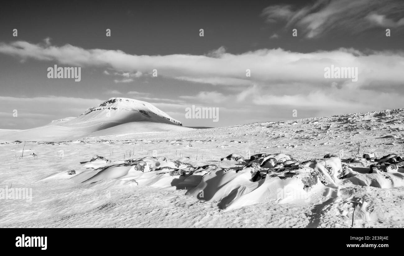 England.Fabulous winter scenery in monochrome of Penyghent one of the famous Yorkshire Dales Three Peaks Stock Photo