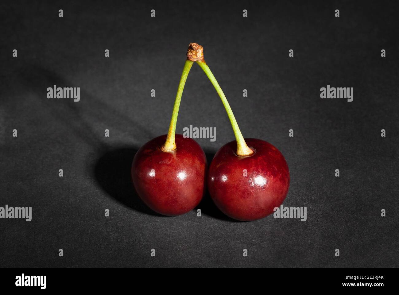 sour cherry on black background Stock Photo