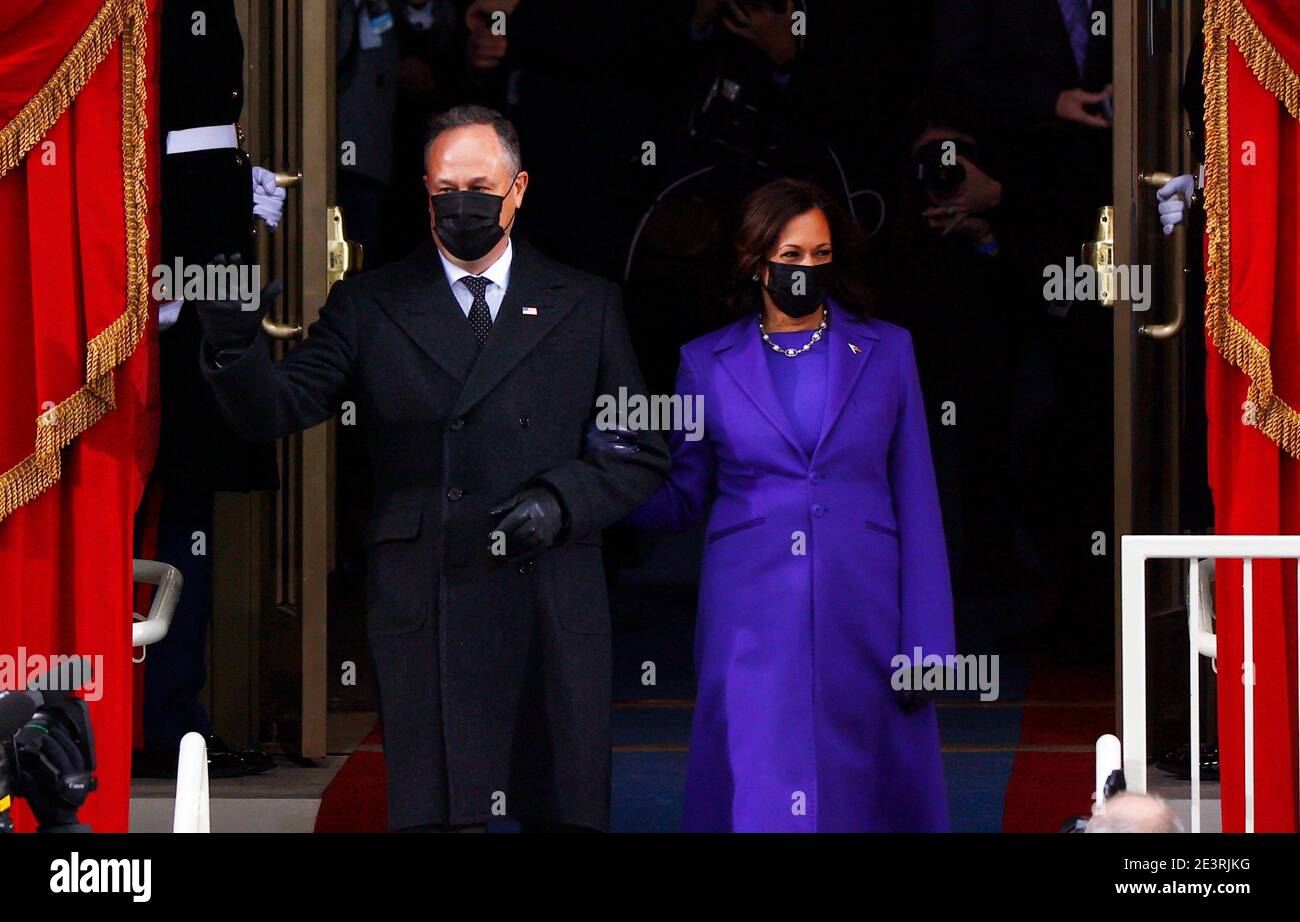 Vice President-elect Kamala Harris and her husband Doug Emhoff arrive on platform during the inauguration of Joe Biden as the 46th President of the United States on the West Front of the U.S. Capitol in Washington, U.S., January 20, 2021. REUTERS/Jim Bourg Stock Photo