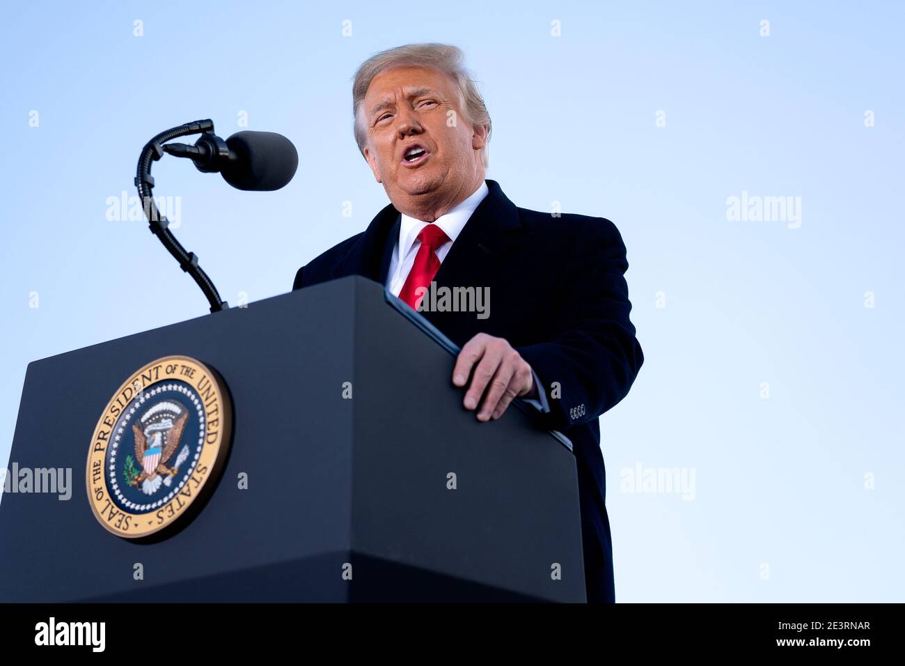 U.S. President Donald Trump speaks during a farewell ceremony at Joint Base Andrews, Maryland, U.S., on Wednesday, Jan. 20, 2021. Trump departs Washington with Americans more politically divided and more likely to be out of work than when he arrived, while awaiting trial for his second impeachment - an ignominious end to one of the most turbulent presidencies in American history. Credit: Stefani Reynolds/Pool via CNP/MediaPunch Stock Photo